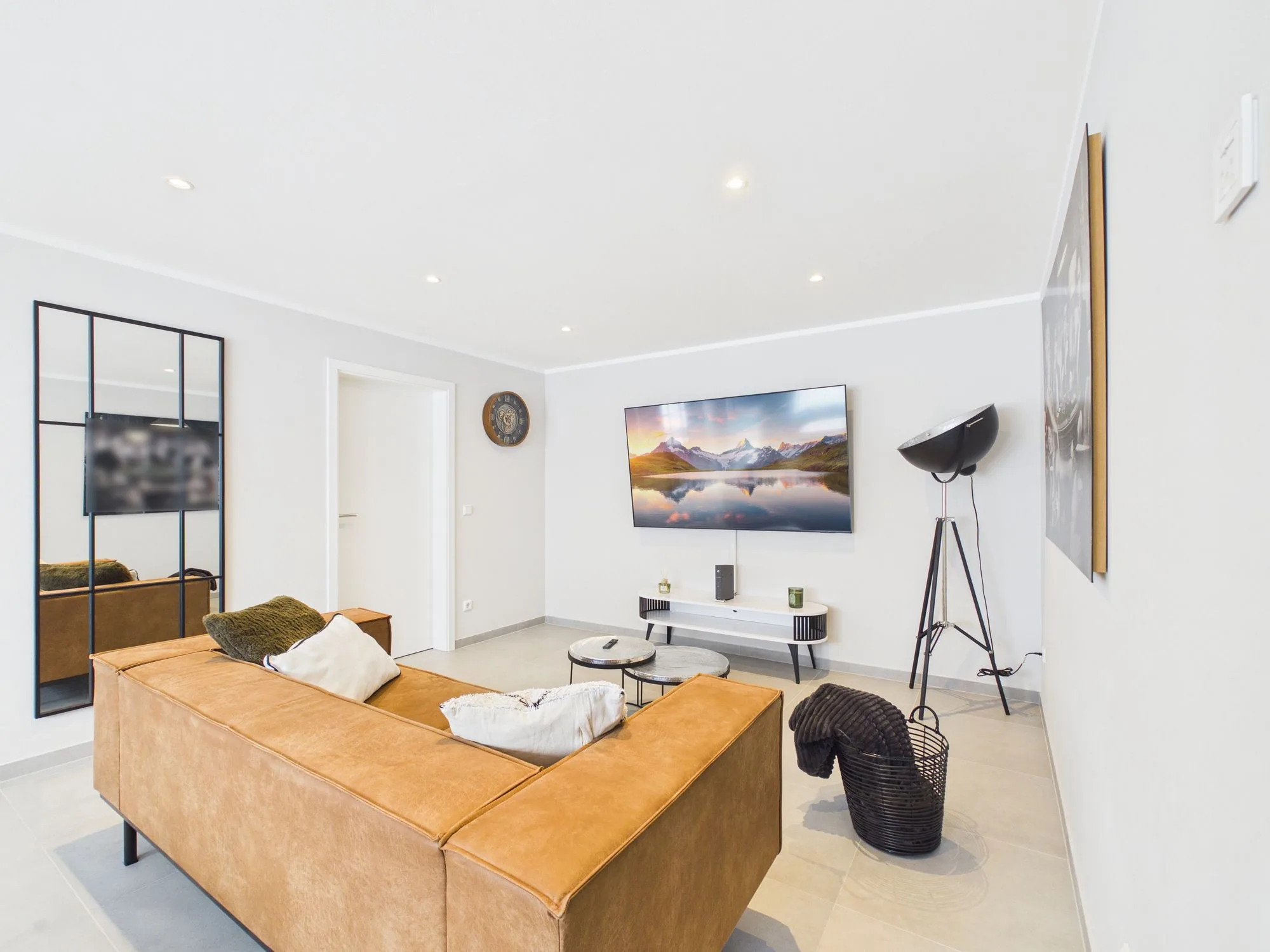 Warm living area with leather sofa, Central Comfort Residence